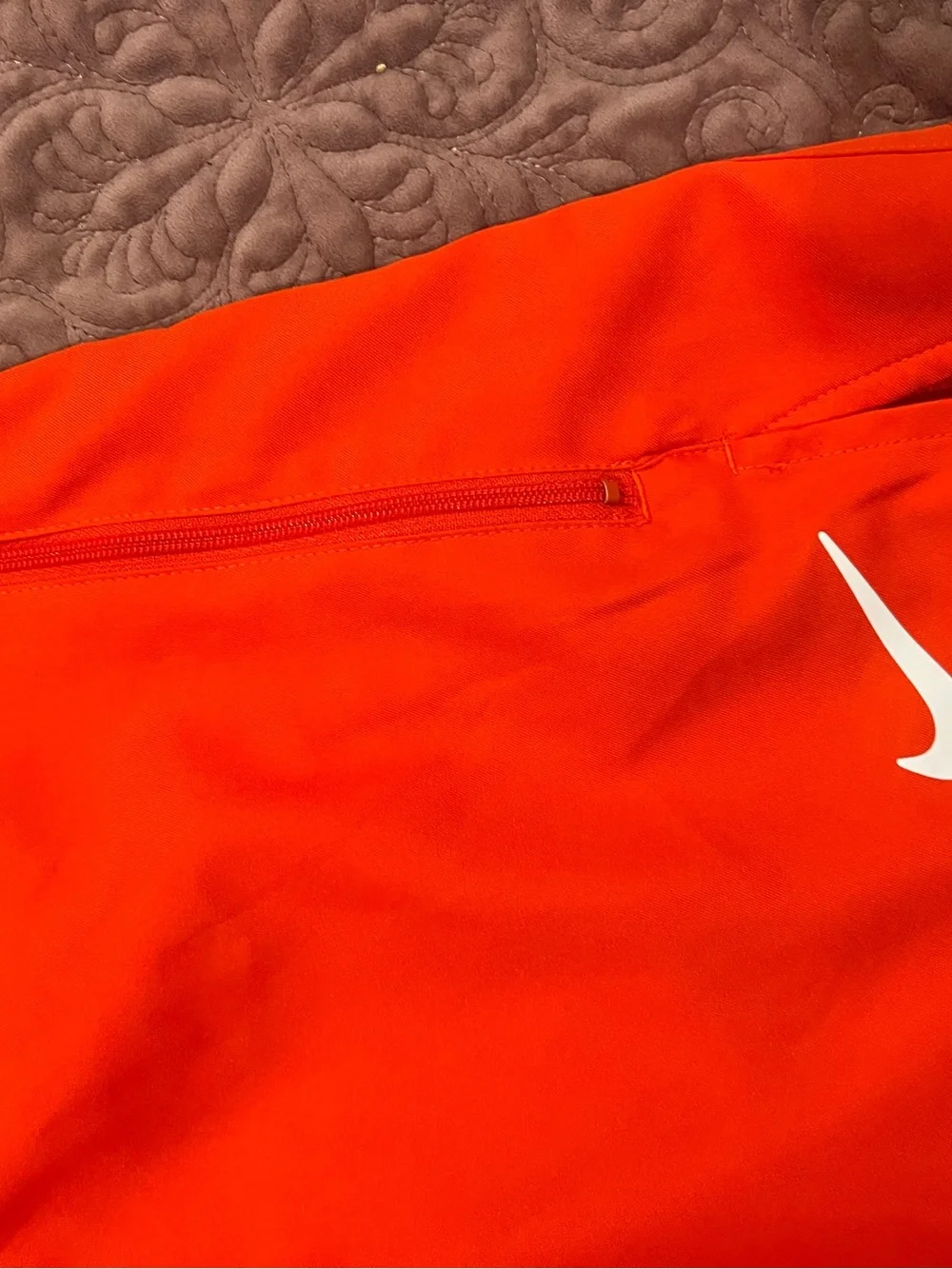 Nike Men’s Bright Orange Athletic Shorts with White Swoosh